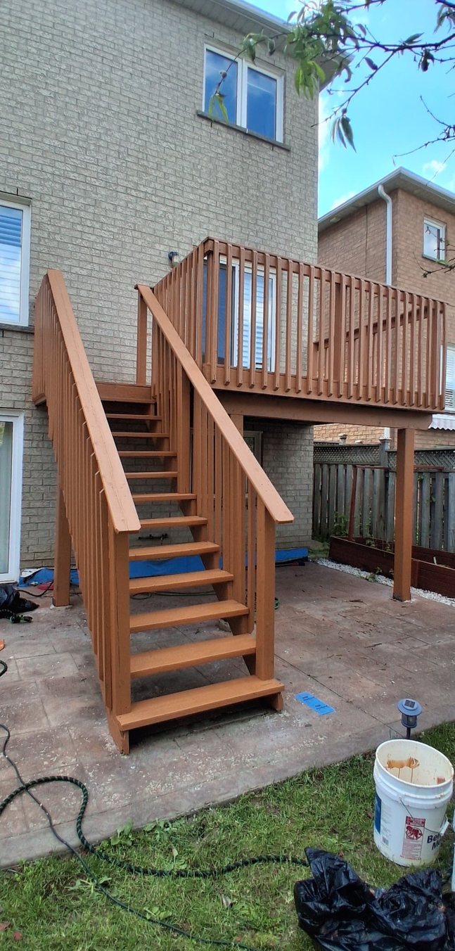 Freshly stained deck staircase after TrueCoat Painting service