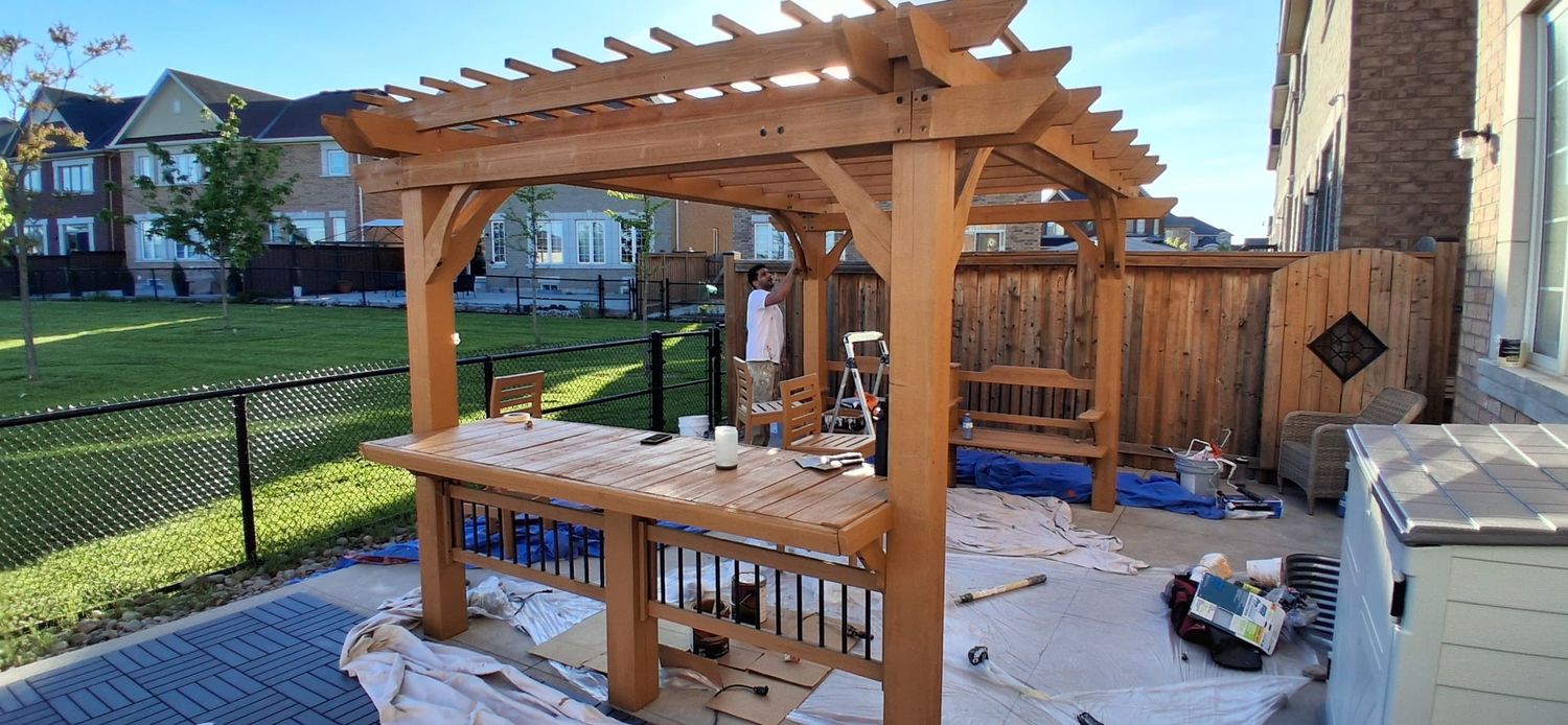 Freshly stained pergola completed by TrueCoat Painting